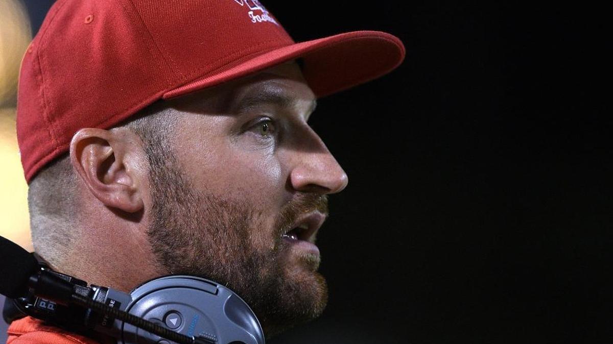 Manatee’s assistant coach James Booth watches from the sidelines in the last regular season game at Paul Maechtle field at Kiker Memorial Stadium at Southeast Friday night.