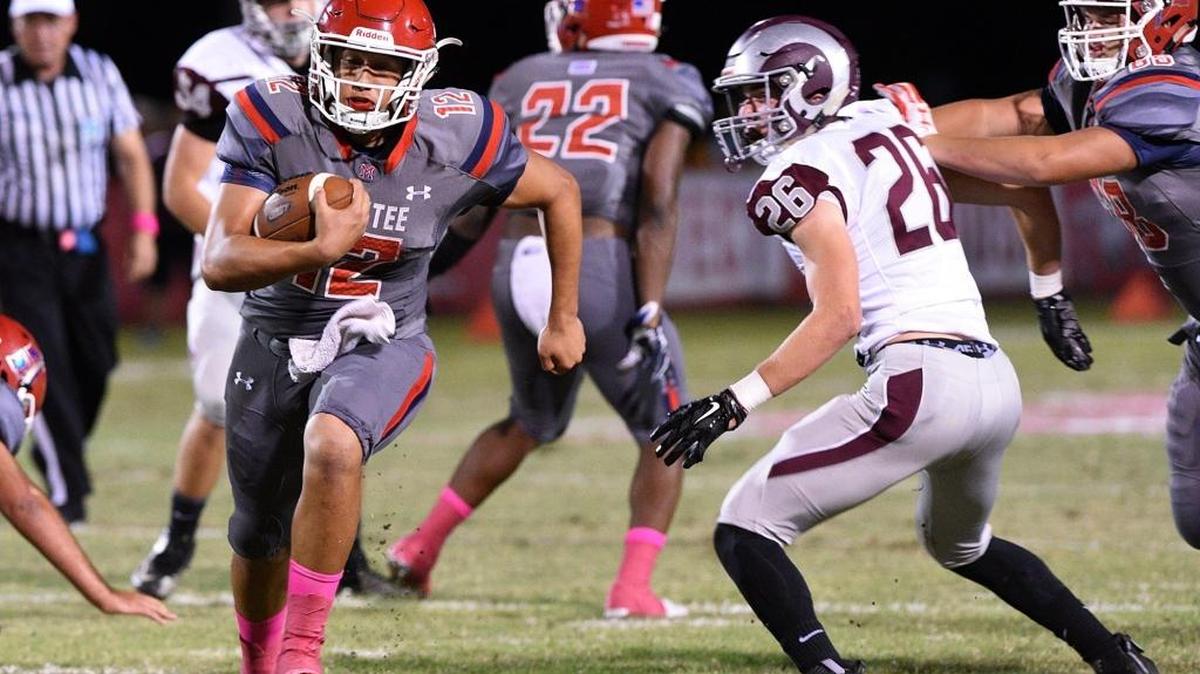 Manatee’s A.J. Colagiovanni runs the ball against Riverview at Friday’s game on Joe Kinnan Field at Hawkins Stadium.