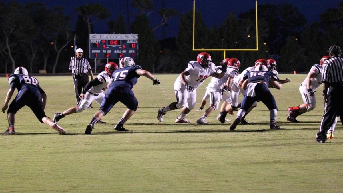 Cardinal Mooney's Mike Bright (No. 72) is playing football a year after his mother was sent to prison and he had nowhere to go.