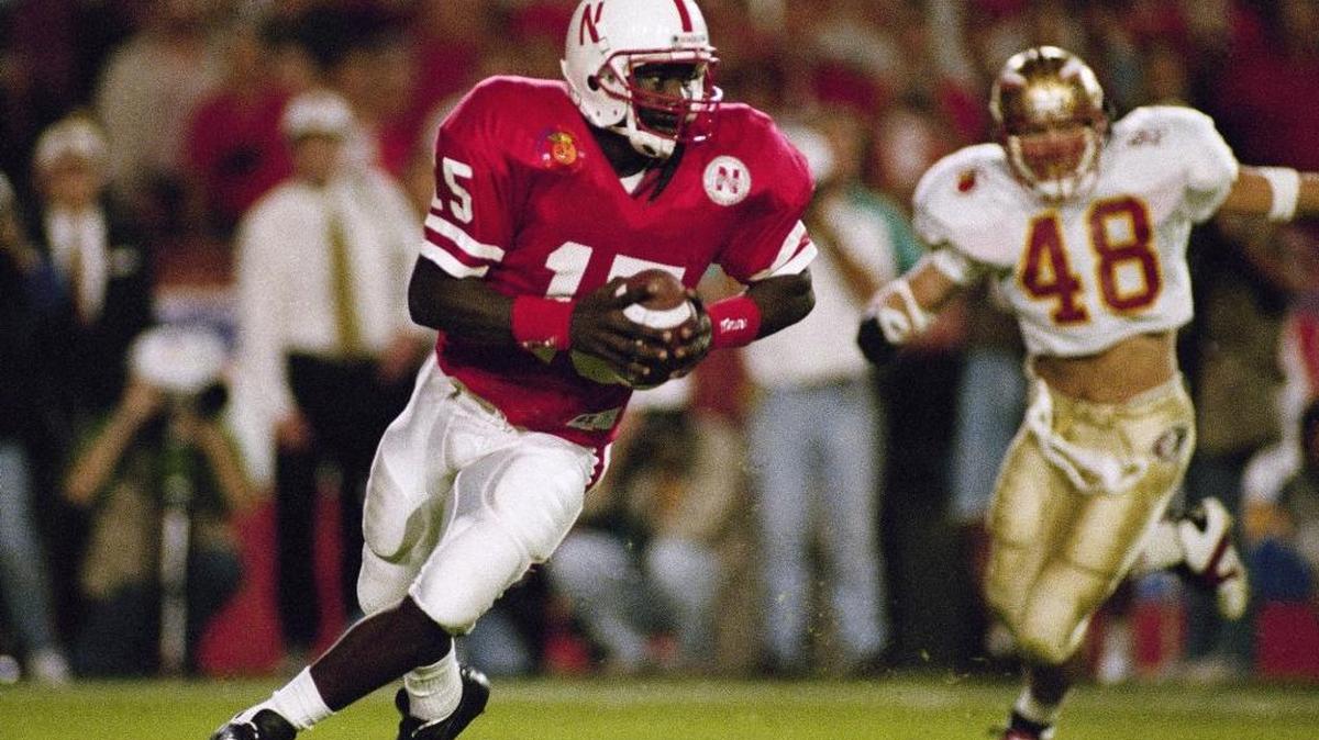 Nebraska quarterback Tommie Frazier (15), with Florida State University’s Todd Rebol (48) in pursuit, picks up a first down in first quarter action at the Orange Bowl on Jan. 1, 1994 in Miami.