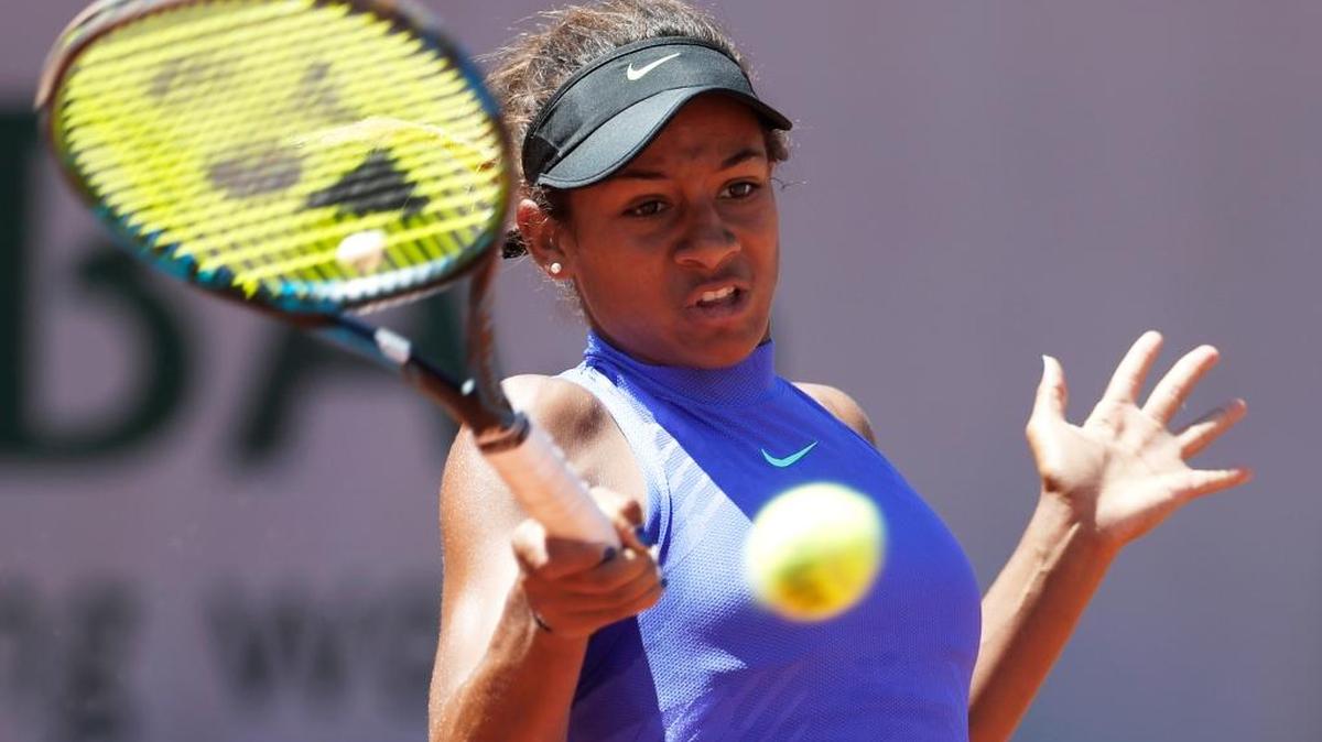 Whitney Osuigwe, of the United States, returns the ball to compatriot Claire Liu during the girls final of the French Open at Roland Garros in Paris.