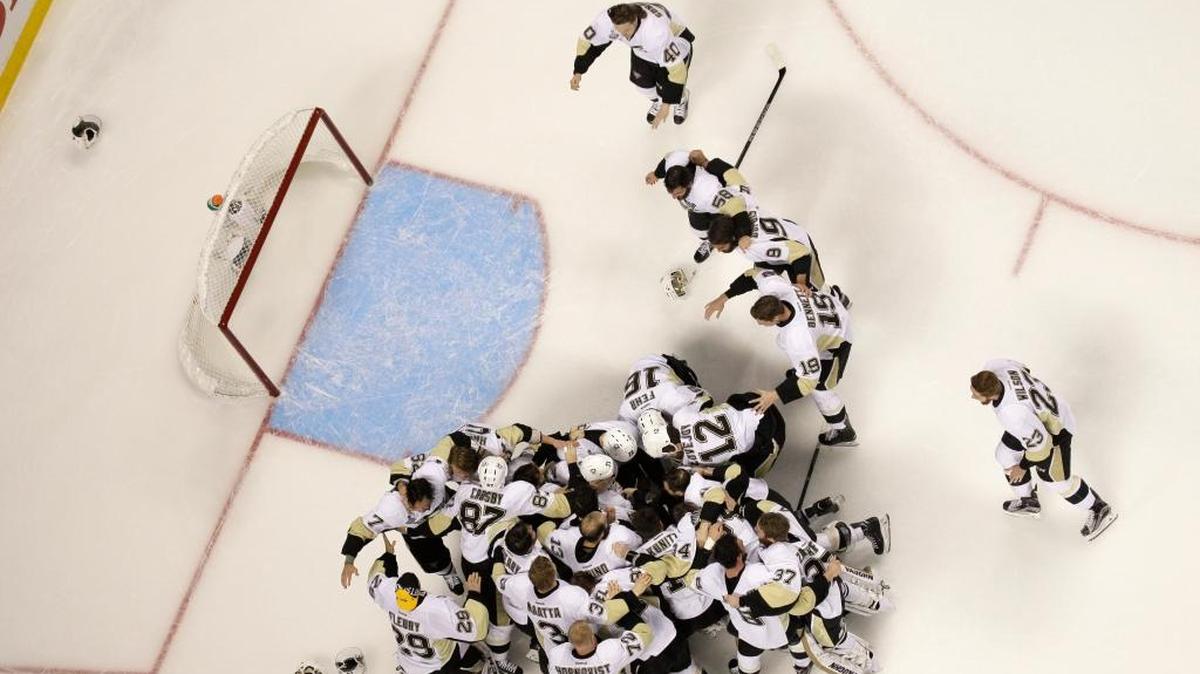 Pittsburgh players celebrate after beating San Jose in Game 6 of the Stanley Cup Finals Sunday in San Jose, Calif. The Penguins won 3-1 to win the series 4-2.