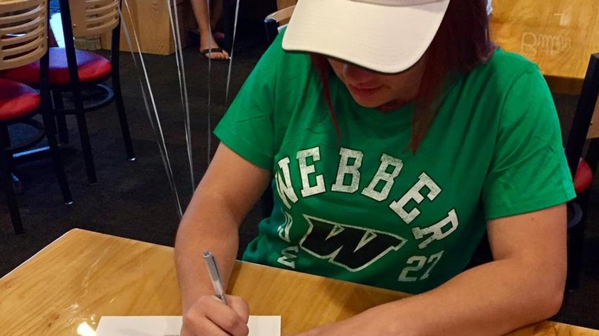 Bri Purington of Manatee High School signs a letter of intent to attend Webber International University in Babson Park to play women’s basketball.