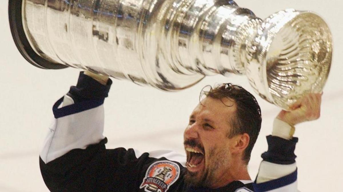 In this June 7, 2004 photo, Tampa Bay Lightning captain Dave Andreychuk hoists the Stanley Cup after the Bolts defeated the Calgary Flames 2-1 in Game 7 to win the title. Andreychuk was selected to the Hockey Hall of Fame on Monday.