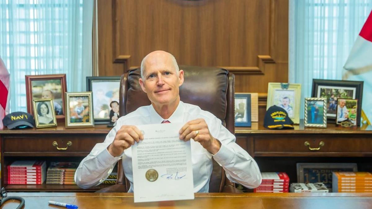 Florida Governor Rick Scott proclaimed UCF as national champions Monday.