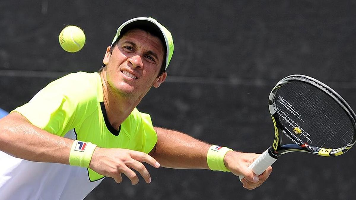 Facundo Bagnis hits a ball out of the court into the air after winning his match during the 2015 Sarasota Open at Lakewood Ranch Tennis Center.