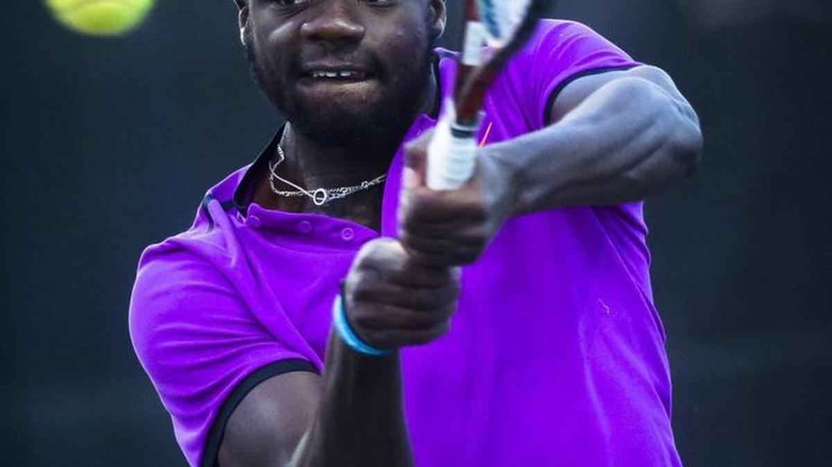 Frances Tiafoe hits a return during his quarterfinal against Henri Laaksonen at the Sarasota Open on Friday at the United Tennis Academy in Bradenton.