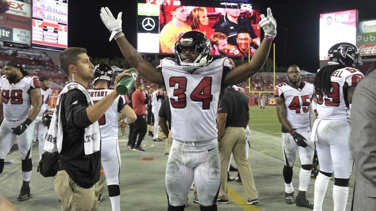 Atlanta Falcons defensive back Brian Poole cheers on the sidelines during the second half of a game against the Tampa Bay Buccaneers in Tampa in November. Poole is one of two Manatee County players on the Falcons’ Super Bowl roster.