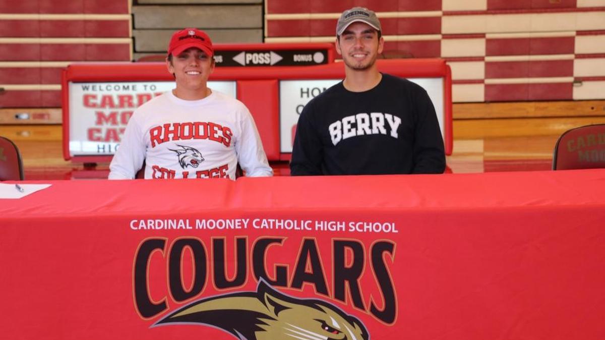 Patrick Warren (left) and Parker Shanahan (right) signed college national letters of intent during a ceremony at Cardinal Mooney this week.