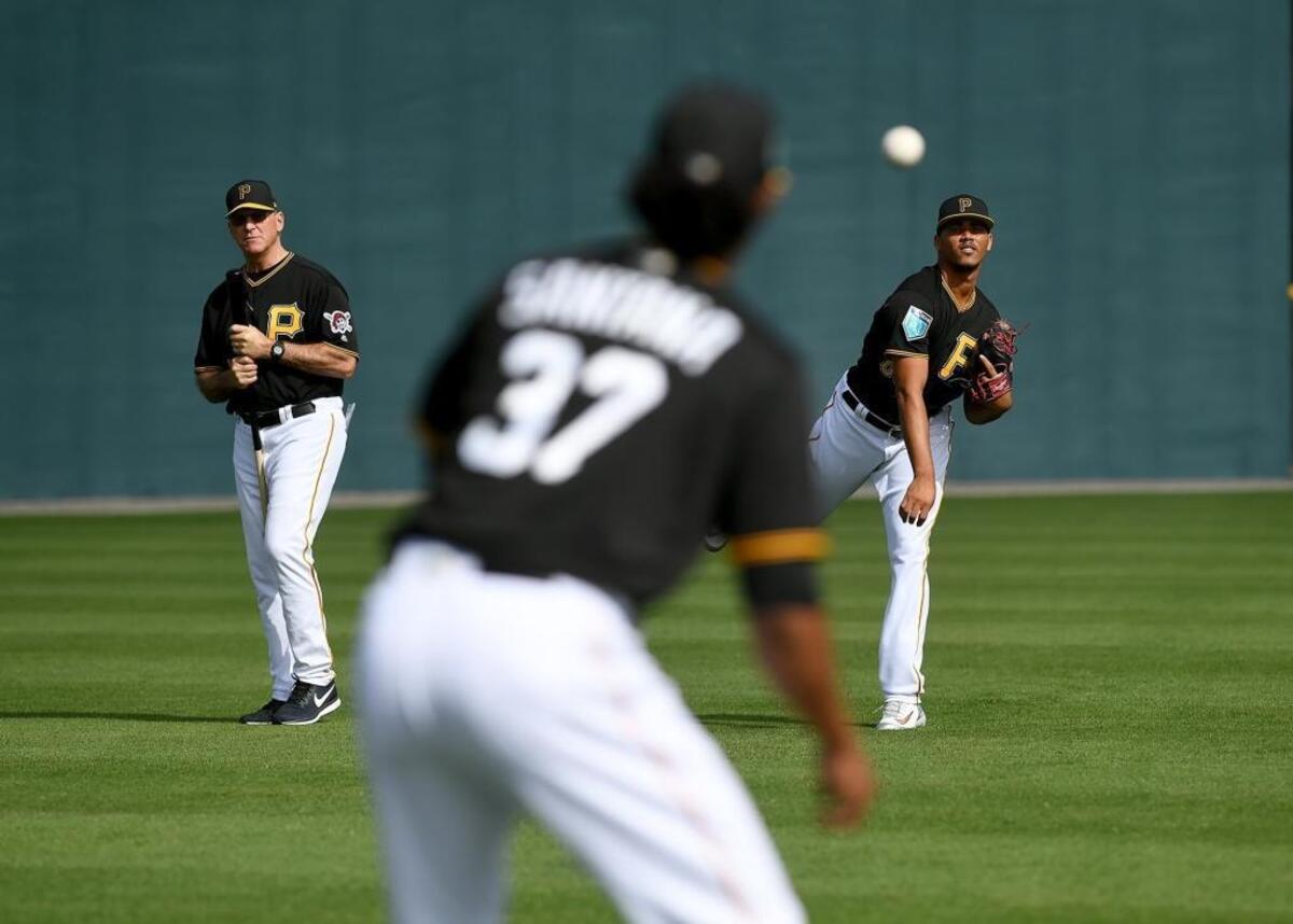 Pirates pitchers warm up during Wednesday’s workout at Pirate City in Bradenton.