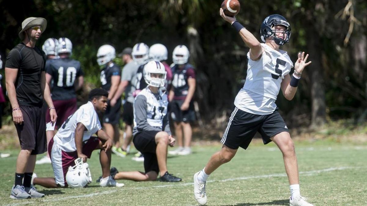 Quarterback Bryan Gagg throws a pass during a spring workout at Braden River High School in May. Gagg transferred from Sarasota High School earlier this year.