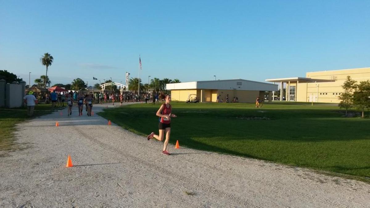 Alison Ecker, the senior team captain for the Manatee High School girls cross country team, runs during the Venice Invitational on Saturday. Ecker finished fifth in the 5K race in a time of 20 minutes, 37.30 seconds.
