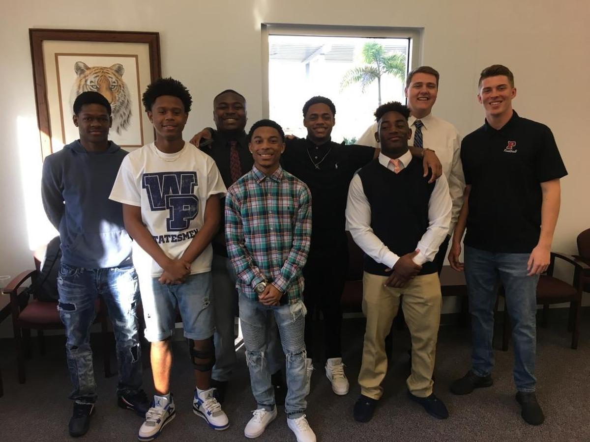 Palmetto had an eight-person signing class on Wednesday. Back row (left to right): Tray Goodman, Eriq Porter, Tyrique Castillo, Jesse West and Andrew Osborne. Front row (left to right): Jason Spicer Jr., Sidney Pompey and Alonzo Houston.