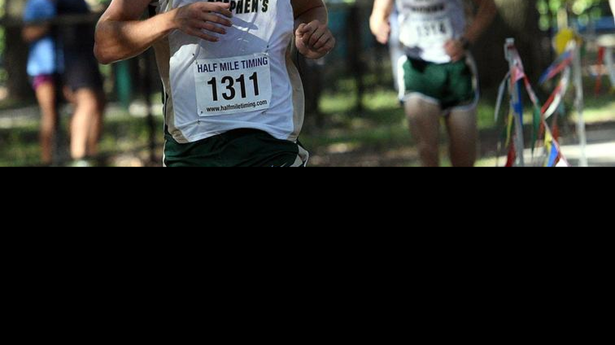 Saint Stephen’s Andrew Csubak approaches the finish line in the District 1A-7 cross country meet at GT Bray Park in Bradenton in October. Csubak won two individual events in the district track and field chammpionship on Thursday.