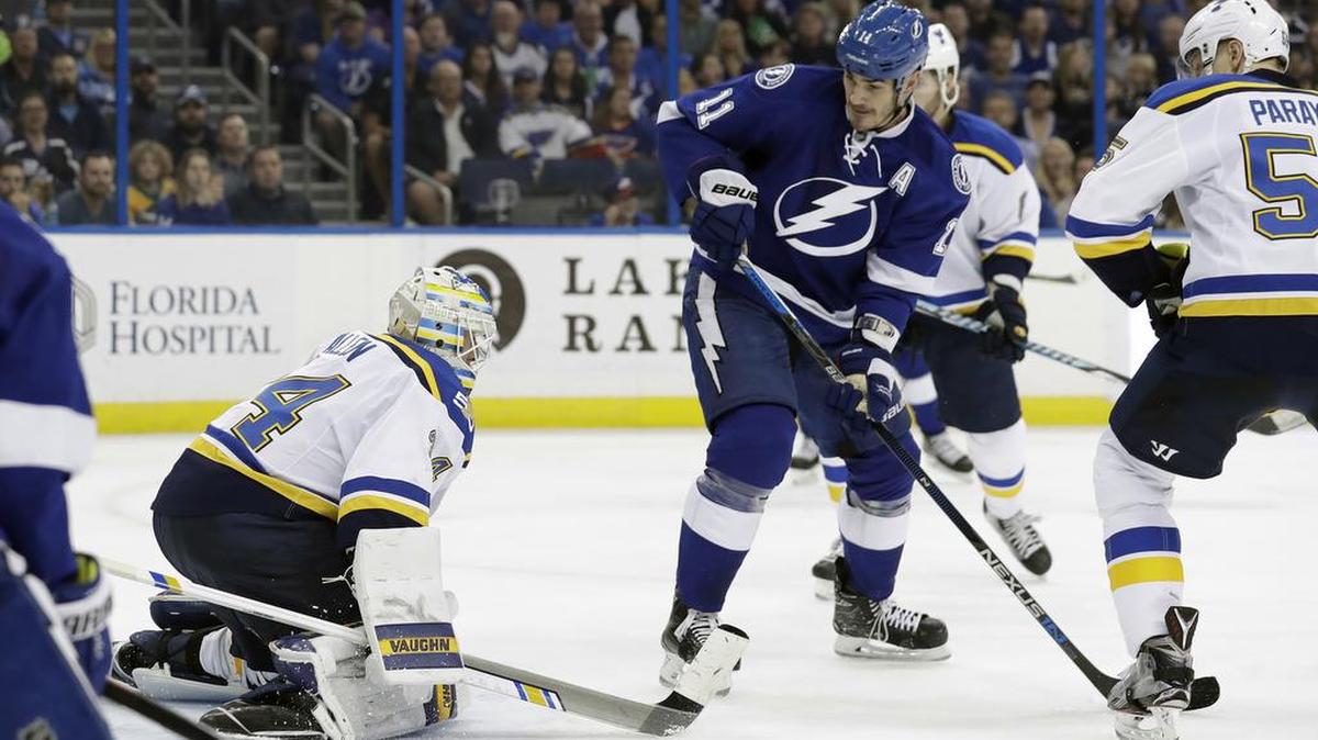 Tampa Bay center Brian Boyle watches as his deflection gets past St. Louis goalie Jake Allen for a goal during the second period of Thursday’s game in Tampa. The Lightning won 5-2.