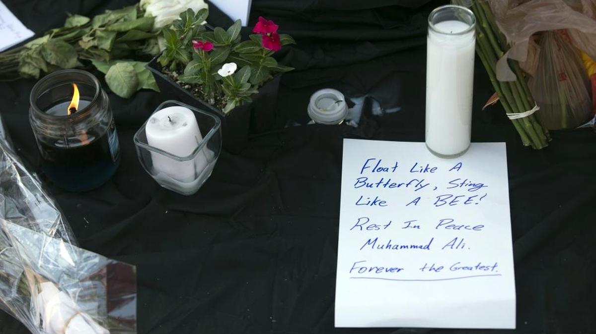 Notes are left at an impromptu memorial for Muhammad Ali outside Scottsdale Osborne Medical Center on Saturday in Scottsdale, Ariz.