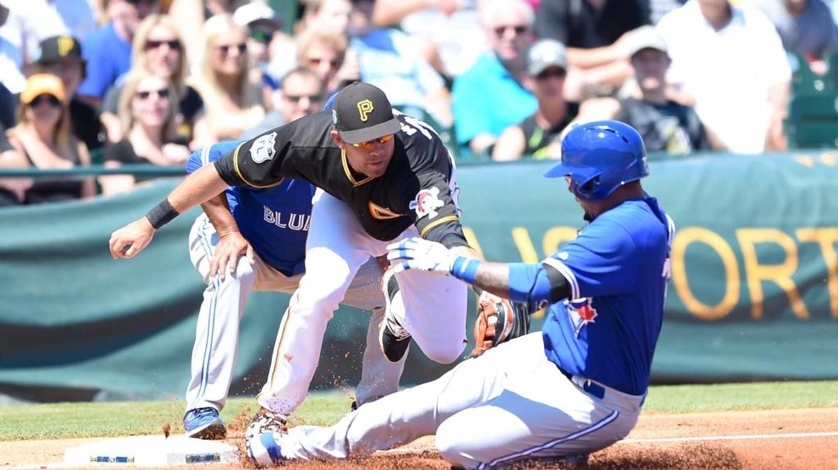 Pittsburgh Pirates third baseman Eric Wood tags out Ezequiel Carrea of the Toronto Blue Jays in Sunday’s game at LECOM Park.