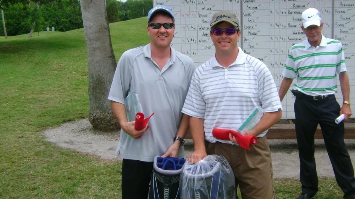 Tim Judy (left) and Phil Walters (right) pose after winning the Bradenton City Men’s Two-Man Combo tournament in 2012 at River Run Golf Links. The two won the event for the fifth time in six years over the weekend.