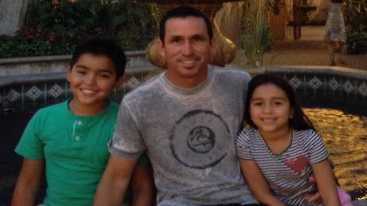 Bradenton Christian announced the hiring of Alvaro Figuerola as its new boys soccer head coach on Friday, August 18, 2017. Figuerola (center) is surrounded by his children, Marco (left) and Mia (right).