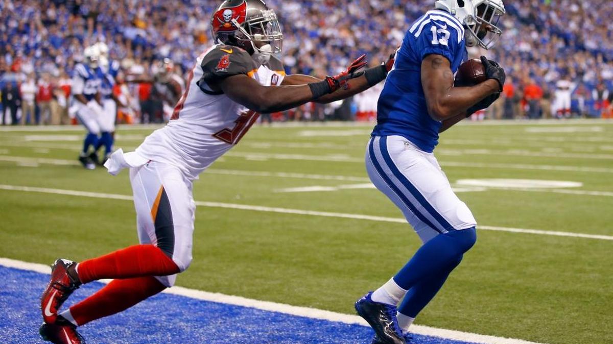 Indianapolis Colts wide receiver T.Y. Hilton, right, catches a touchdown pass as Tampa Bay Buccaneers strong safety Major Wright tries to defend during a game in Indianapolis in November 2015.