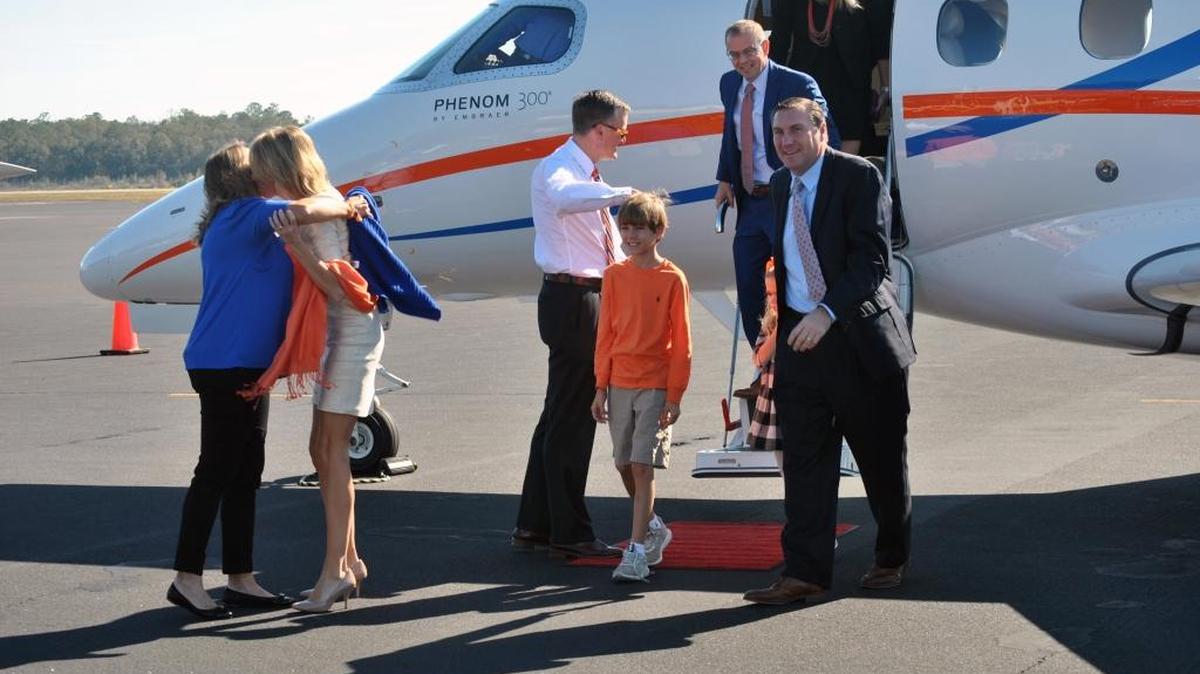 New Florida coach Dan Mullen arrives in Gainesville with his family on Monday.