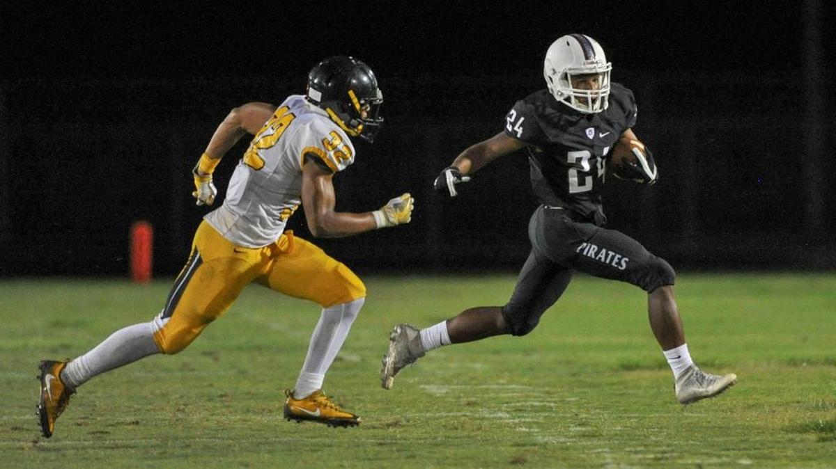 Braden River High School’s Cameron White eludes a St. Petersburg Lakewood pursuer during Friday’s spring game in Bradenton.