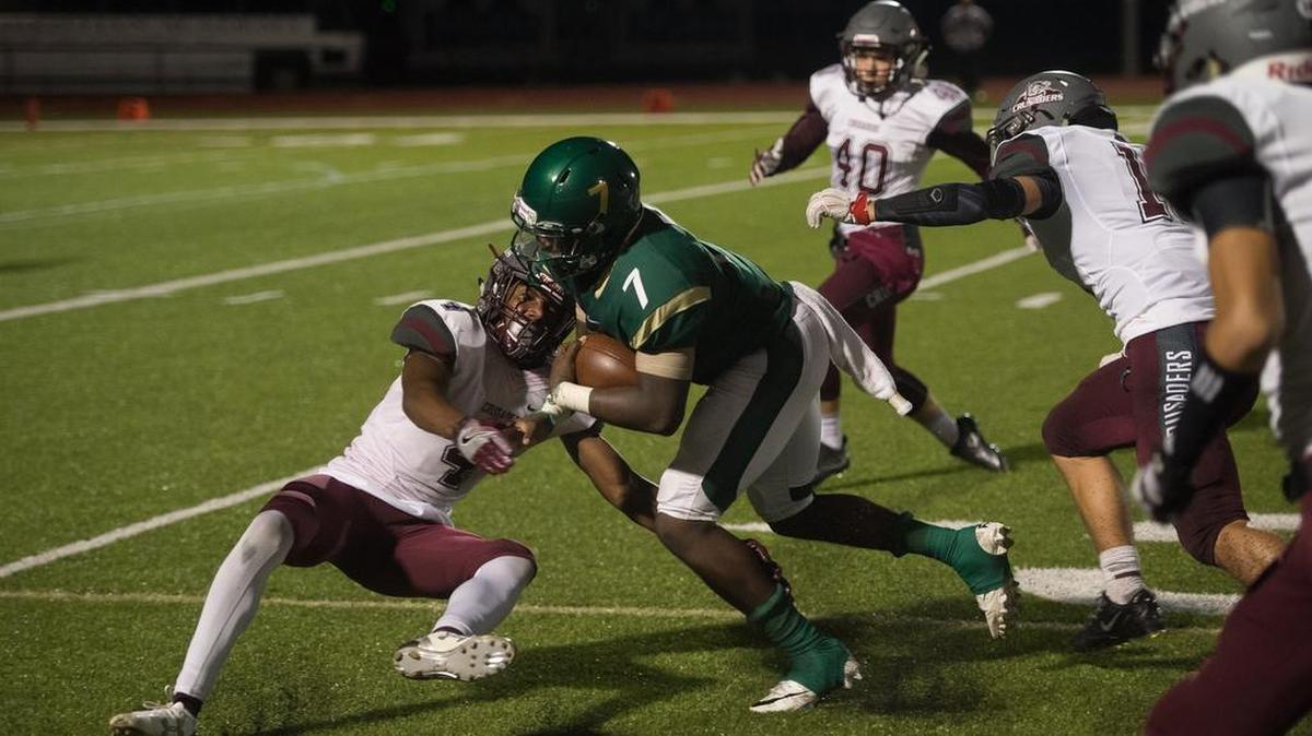 Saint Stephen’s Fred Billy plows through the Seffner defense during a game in October at Saint Stephen’s. Billy was in the top 10 vote-getters for the SSAC’s player of the year voting.