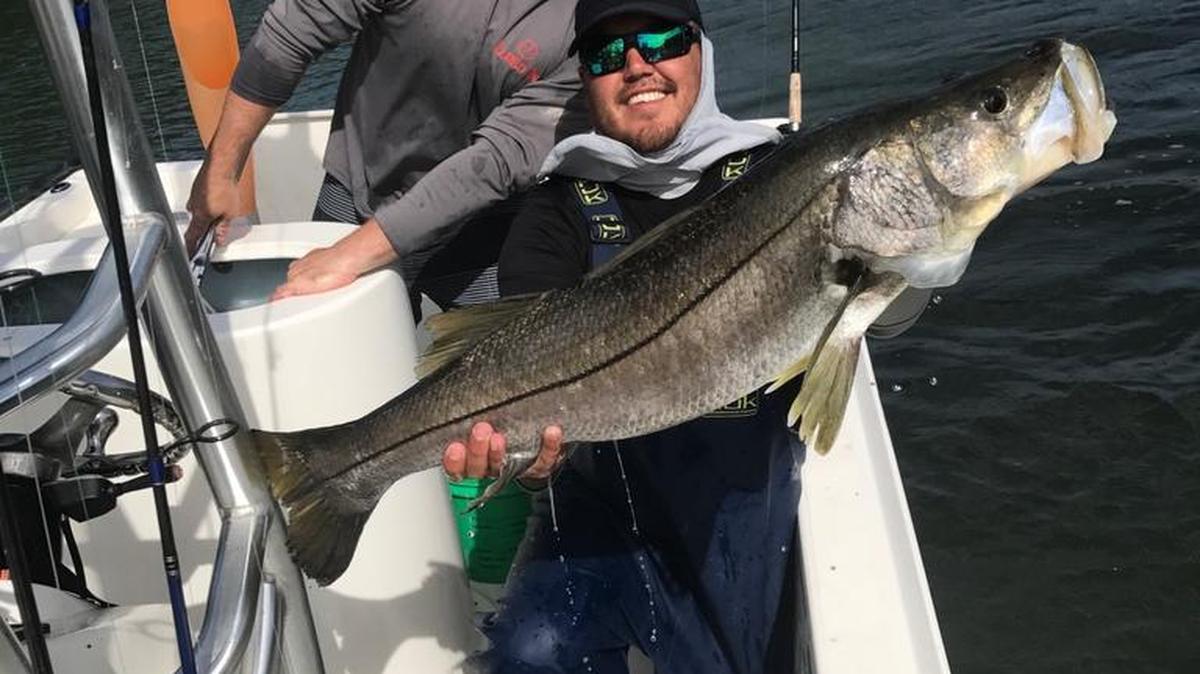 FL Fishing Team members show off a winning catch during the 34th annual Crosthwait Fishing Tournament last weekend.
