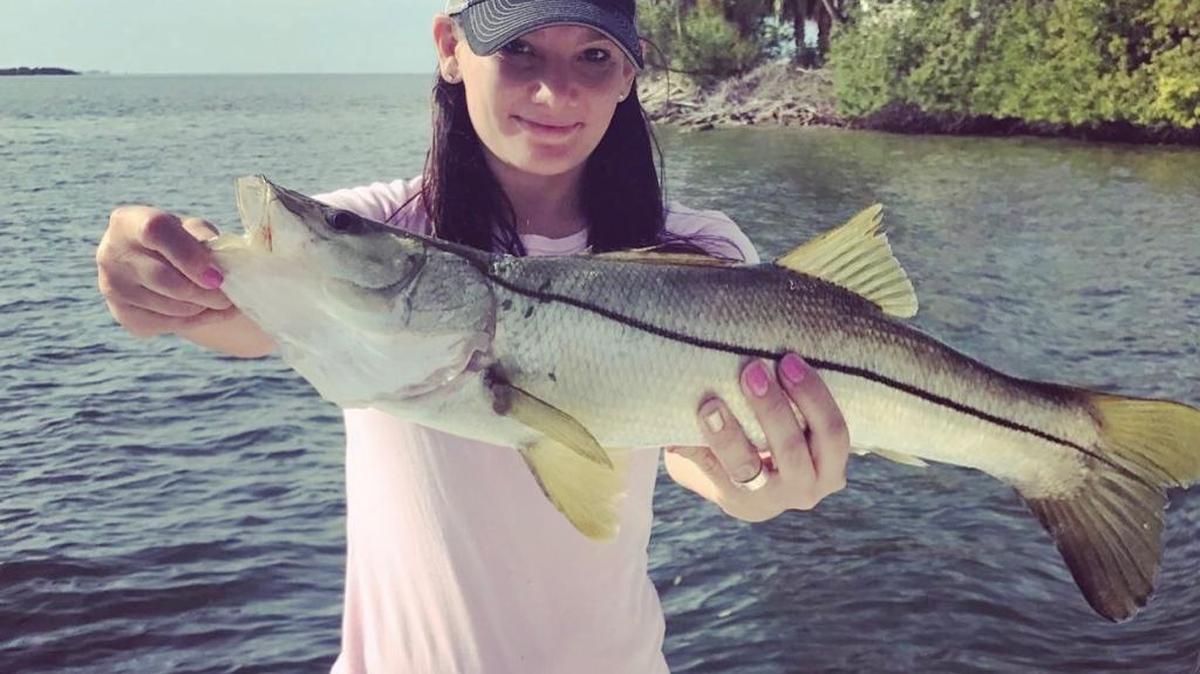Leslie McHugh holds one of her many catches.