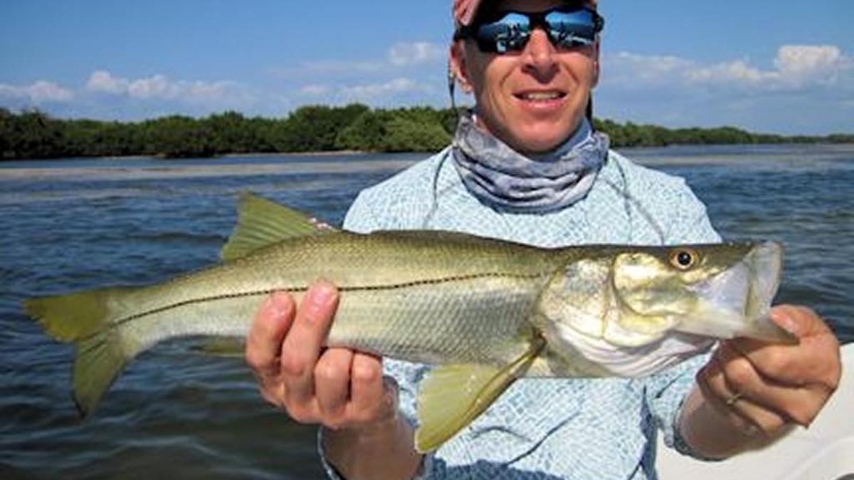 Dave Reinhart of Virginia with one of many catches Thursday in Gasparilla Sound near Boca Grande.
