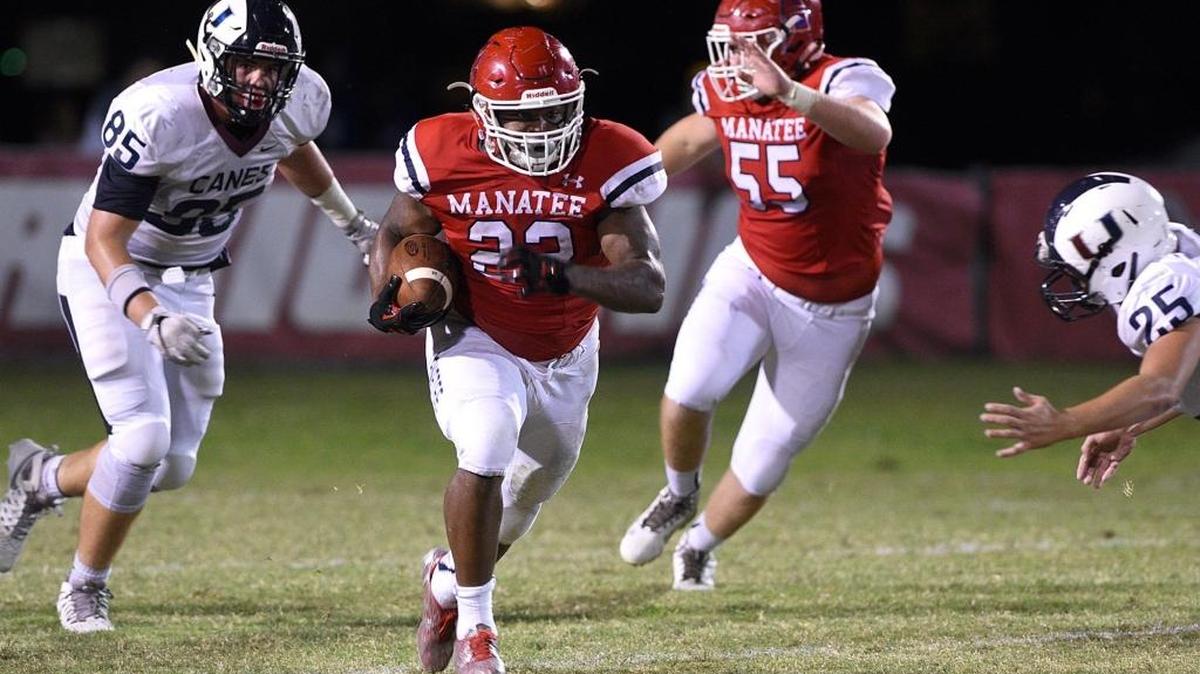 Manatee’s Josh Booker breaks into the open field during Friday night’s win against Palm Harbor.