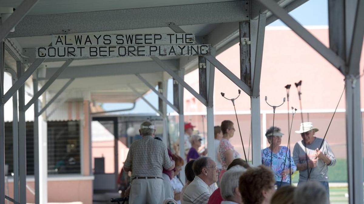 Shuffleboard players compete in a tournament at Trailer Estates during the 2016-17 season.