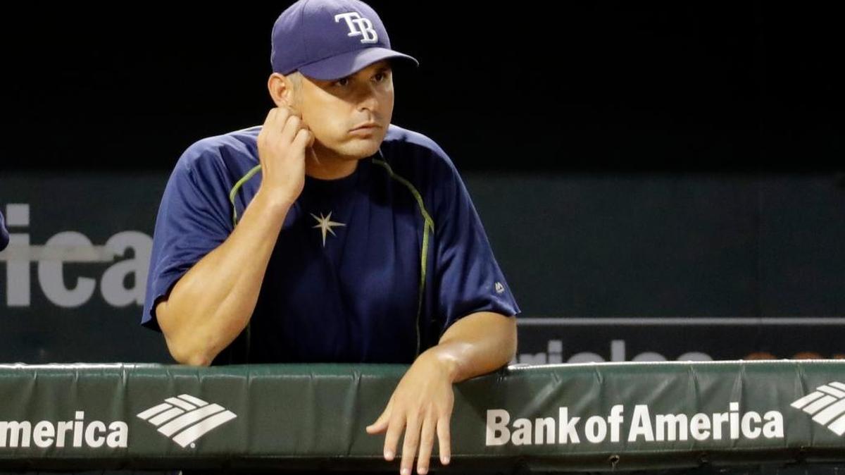 Tampa Bay Rays manager Kevin Cash stands in the dugout during a baseball game against the Baltimore Orioles in Baltimore Friday.