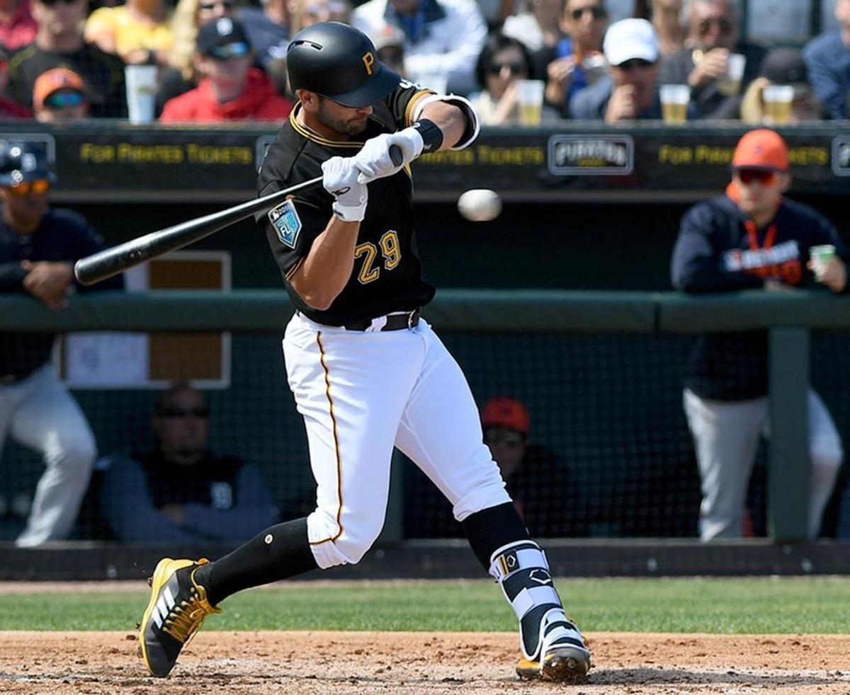 The Pirates’ Francisco Cervello tries to check his swing during Thursday’s spring training game against the Detroit Tigers at LECOM Park.