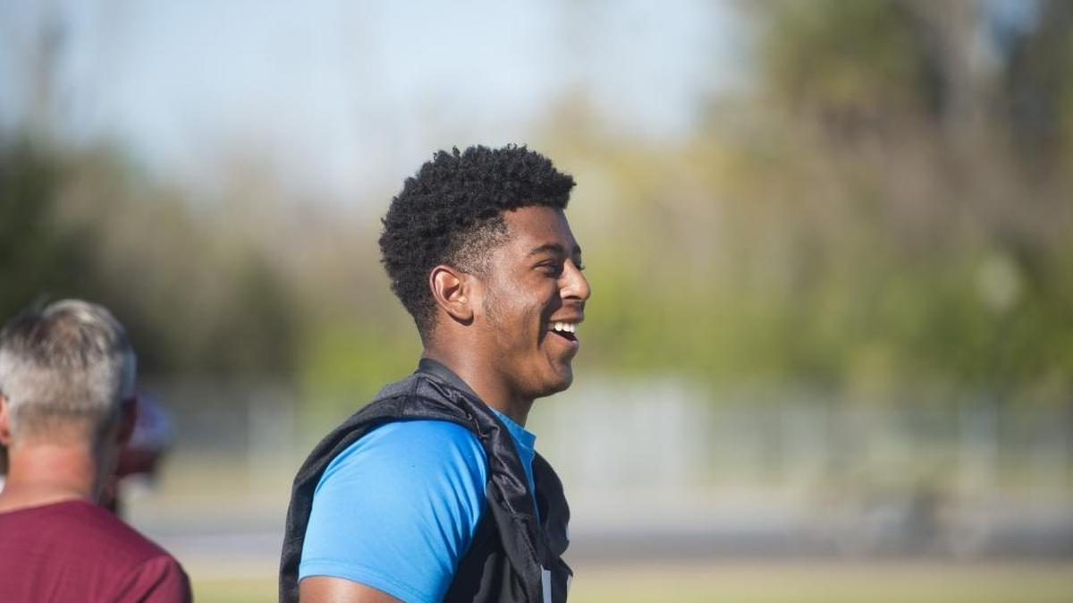 Taylor Upshaw laughs with his teammates on the sidelines during a walk through practice at Braden River High School on Thursday afternoon, November 10, 2016 in Bradenton. HERALD FILE PHOTO.
