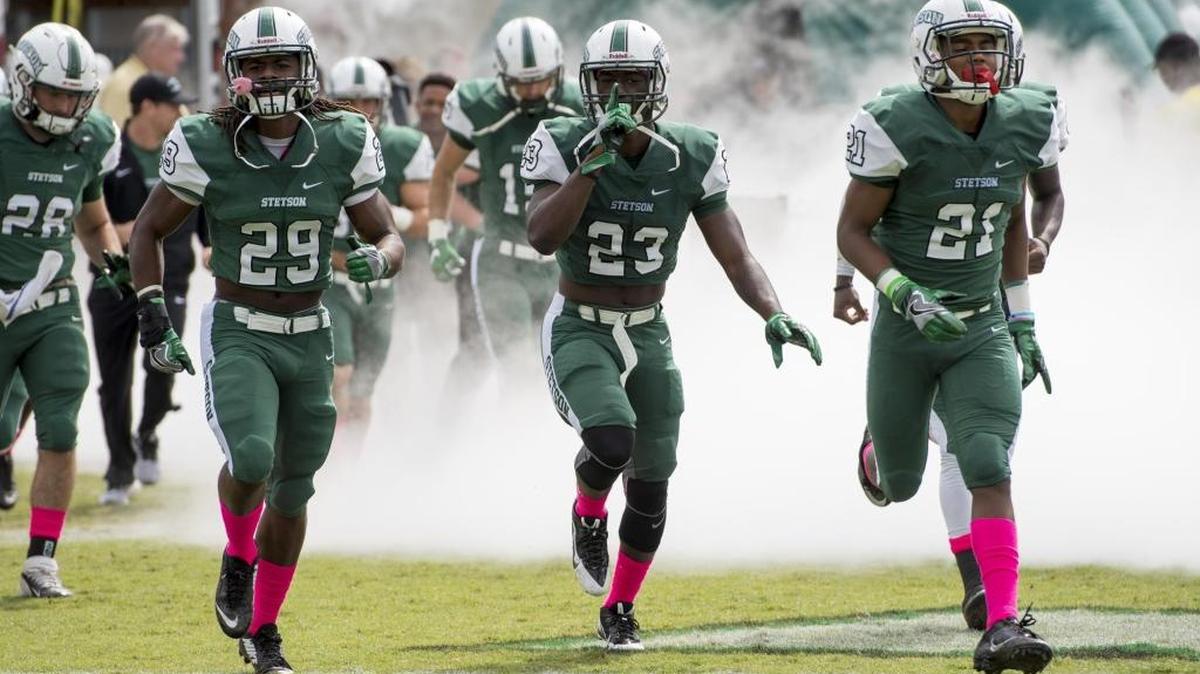 Stetson players take the field in DeLand during the 2016 season.