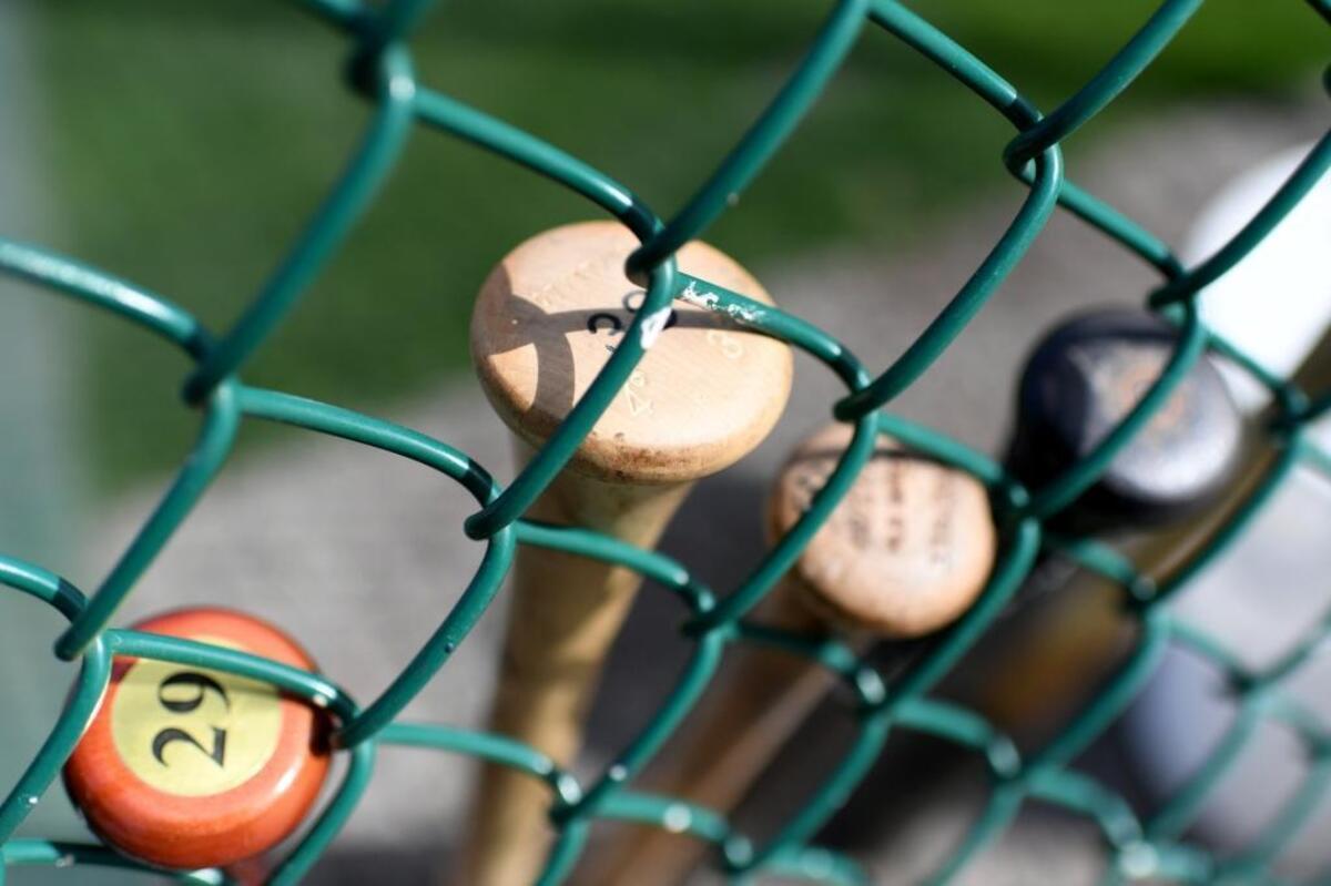 Bats lean against the fence as the Pirates open spring training in preparation for the 2018 season.