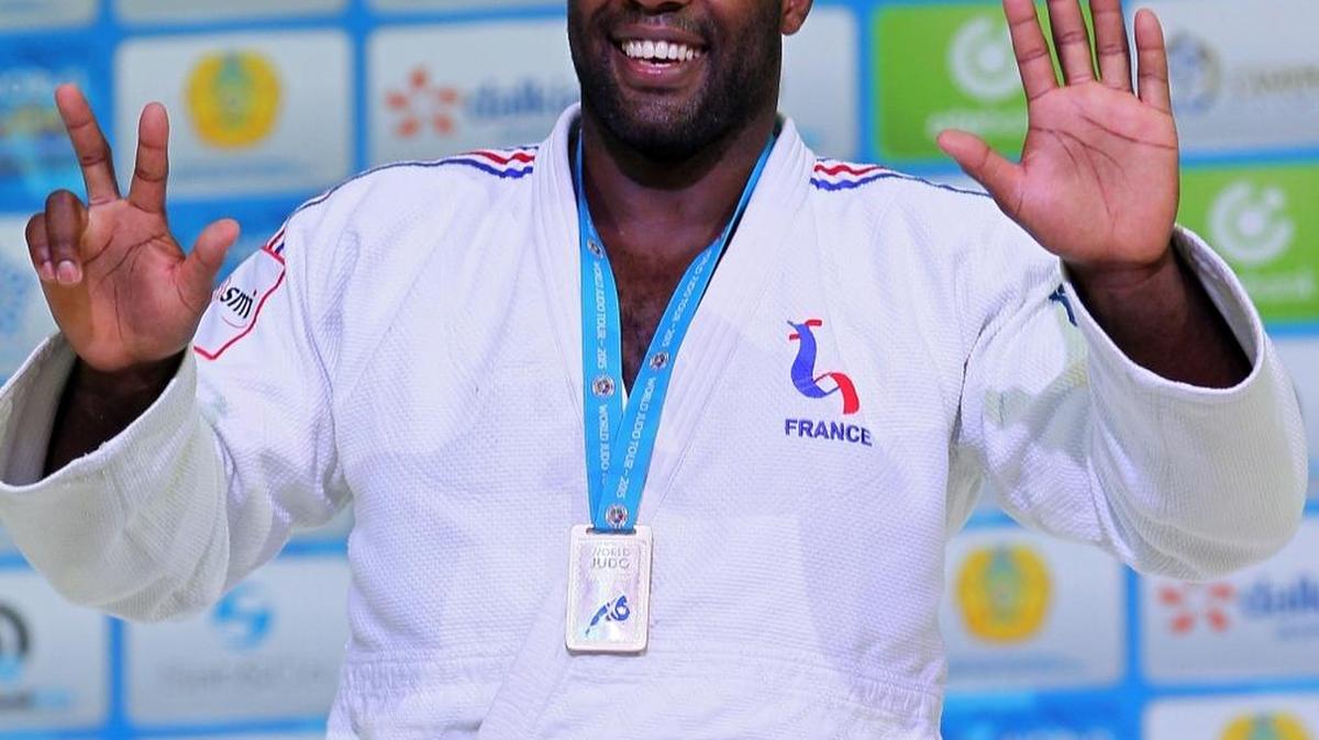 In this Aug. 29, 2015, file photo, France’s Teddy Riner poses during an award ceremony of the men’s +100 kg final at the World Judo Championships in Astana, Kazakhstan. The 27-year-old heavyweight has won a record eight world championship titles, five European titles and two Olympic medals, including a gold at the London games.