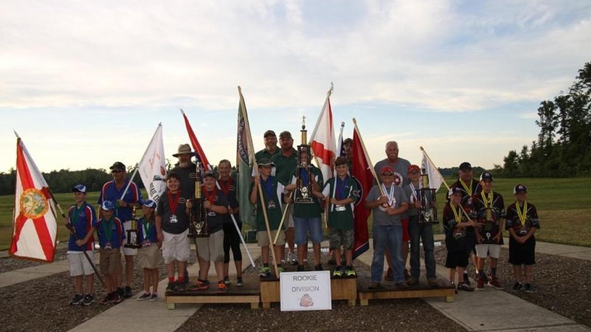 FishHawk Dynasty’s rookie sporting clay shooters stand atop the podium after winning a national title at the 2016 Scholastic Clay Target Program National Team Championships.