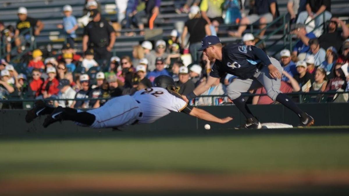 Will Craig dives back into first on a pickoff attempt during the home opener in April. On Tuesday in Jupiter, Craig had an RBI single, helping the Marauders beat Jupiter 3-1.