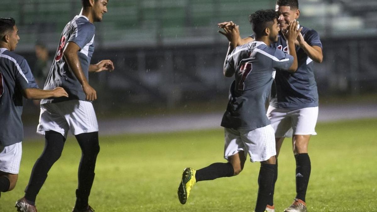 Palmetto players Jorge Morales and Gilberto Caballero celebrate Morales' header goal as Lakewood Ranch High School hosts Palmetto High School for a game on Friday night, January 6, 2017 in Lakewood Ranch. HERALD FILE PHOTO.