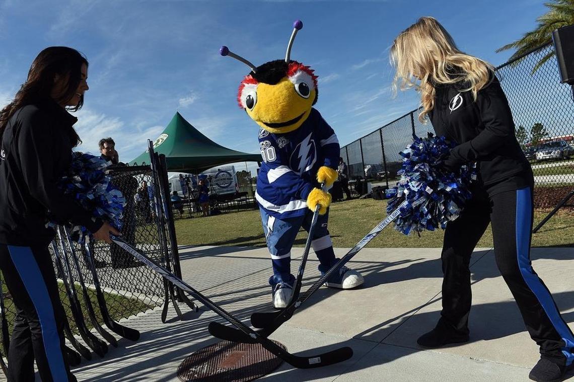 Lightning mascot ThunderBug faces off with cheerleaders during Wednesday’s news conference at the Premier Sports Campus in Lakewood Ranch.