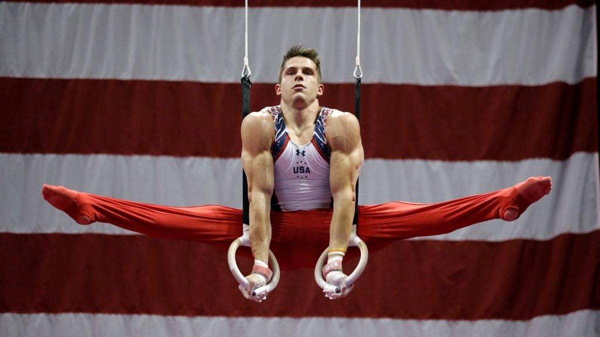 In this June 23 file photo, Chris Brooks competes on the rings during the U.S. men’s Olympic gymnastics trials in St. Louis. An alternate on the Olympic team that faded to fifth in London in 2012, Brooks heads to Rio as team captain.
