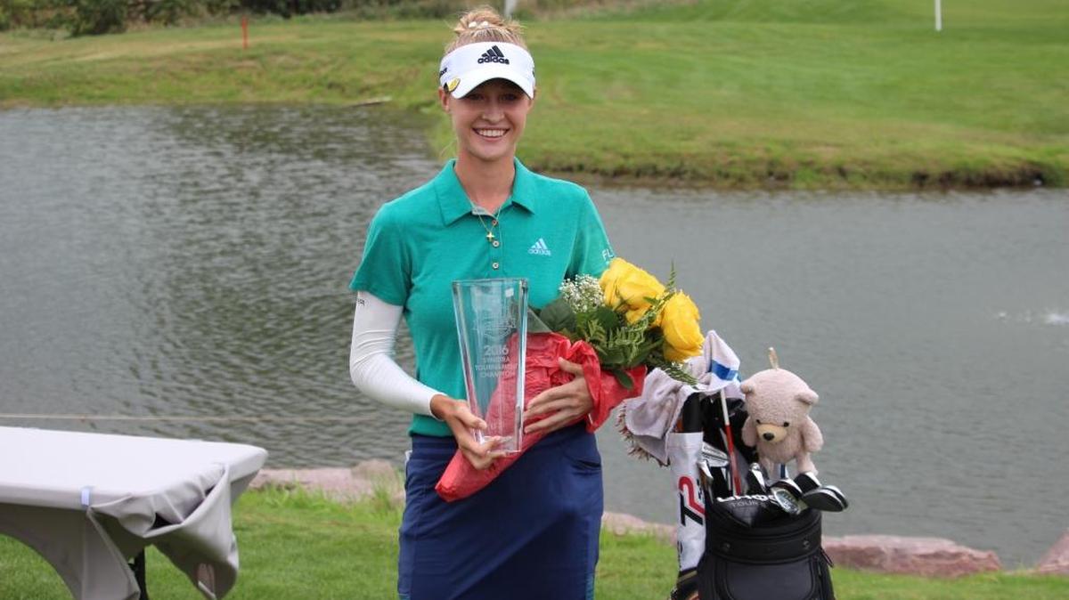 Nelly Korda poses during the post-tournament ceremony in Sioux City, S.D. Korda won the Sioux City GreatLife Challenge on Sunday, Sept. 2016. The title is the first of her pro career.