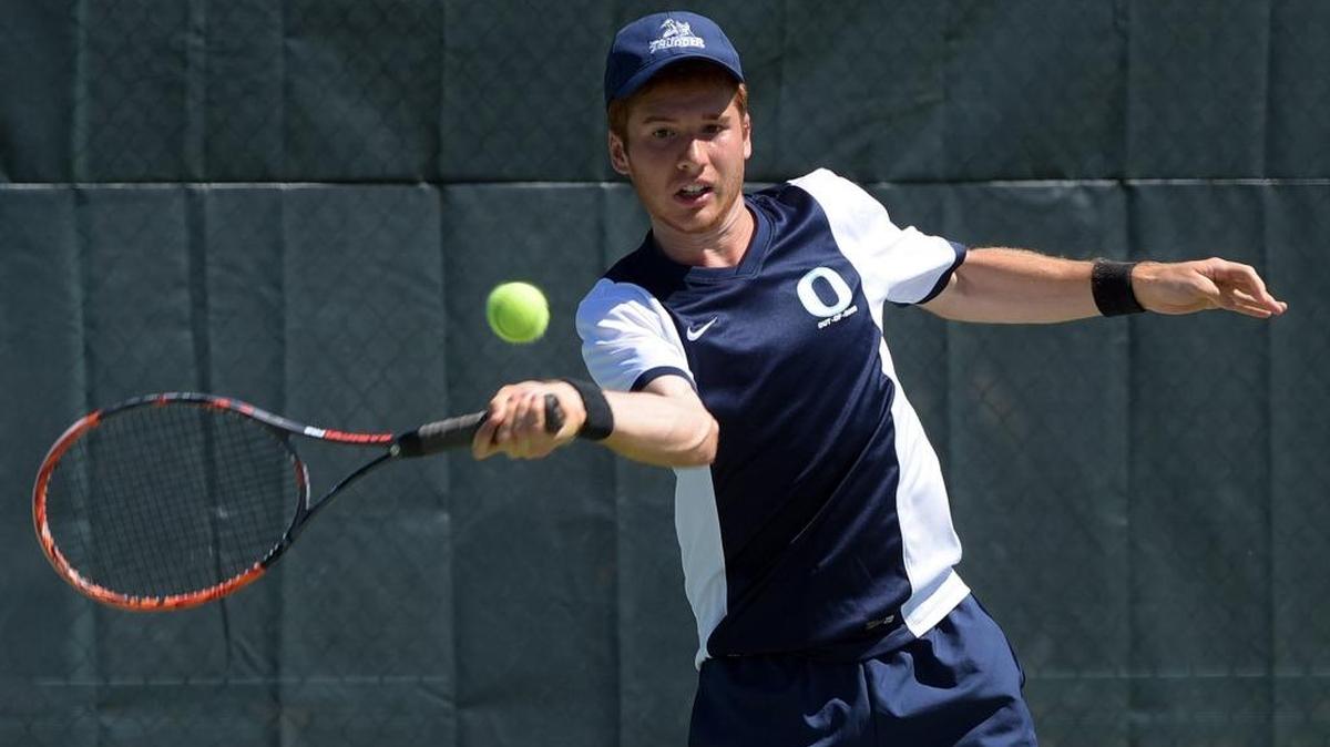 Matt Jones of ODA returns the ball during the doubles finals of a district tennis tournament at St. Stephen's Episcopal School Monday.
