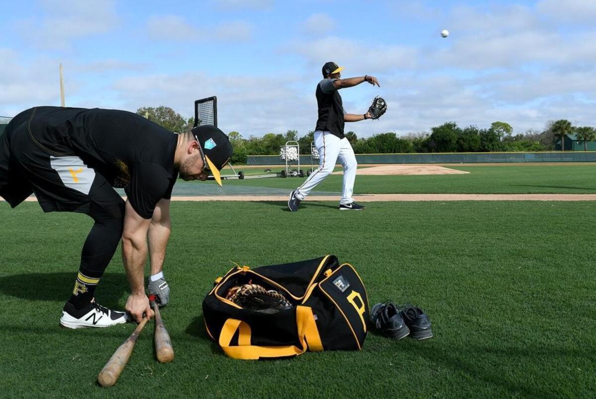 Players get loose as the Pirates open spring training at Pirate City.