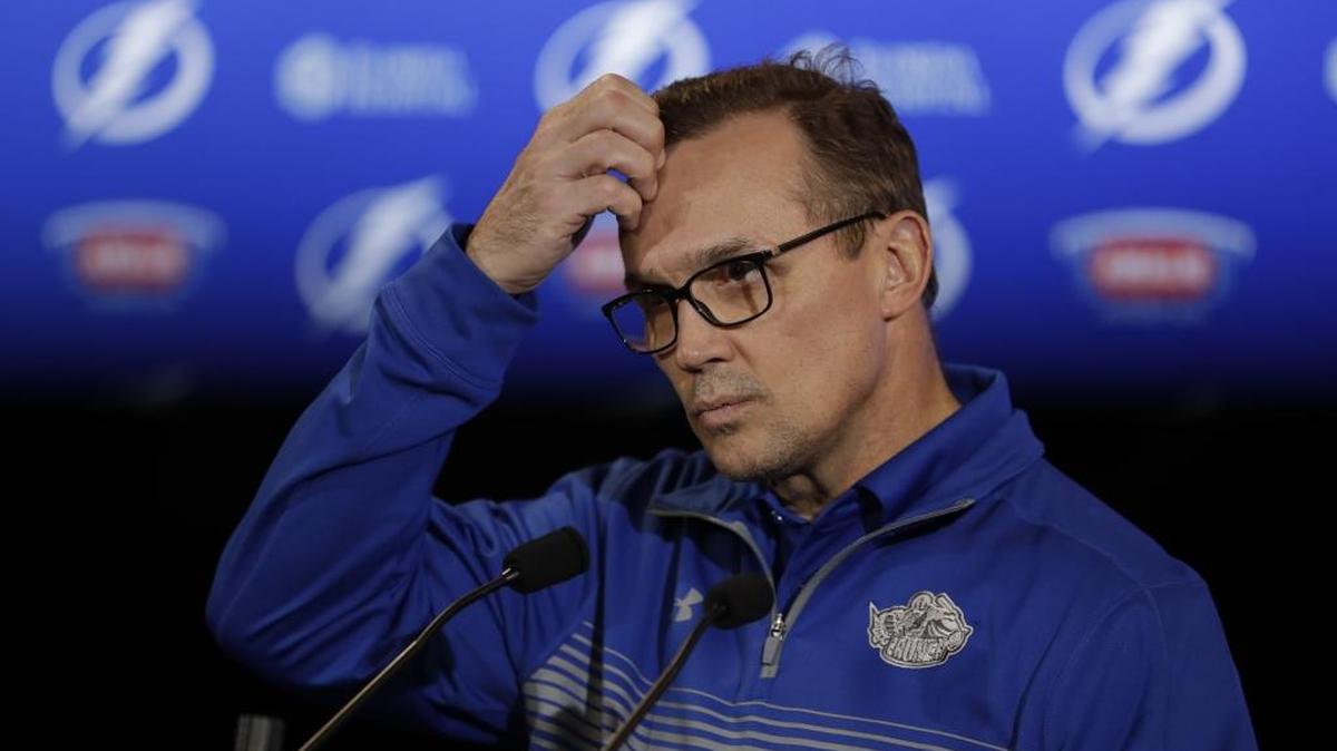 Tampa Bay Lightning general manager Steve Yzerman gestures as he speaks to the media about recent trades during a news conference in March.