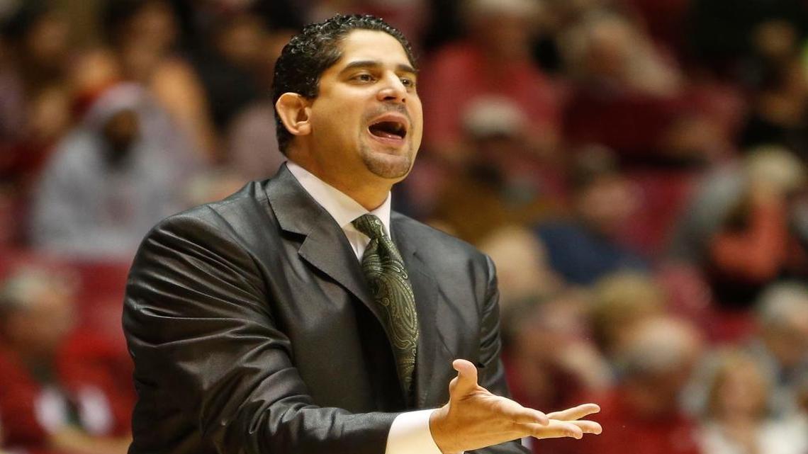 South Florida coach Orlando Antigua calls a play to his team against Alabama in the first half of an NCAA college basketball game, Tuesday, Dec. 2, 2014, in Tuscaloosa, Ala.