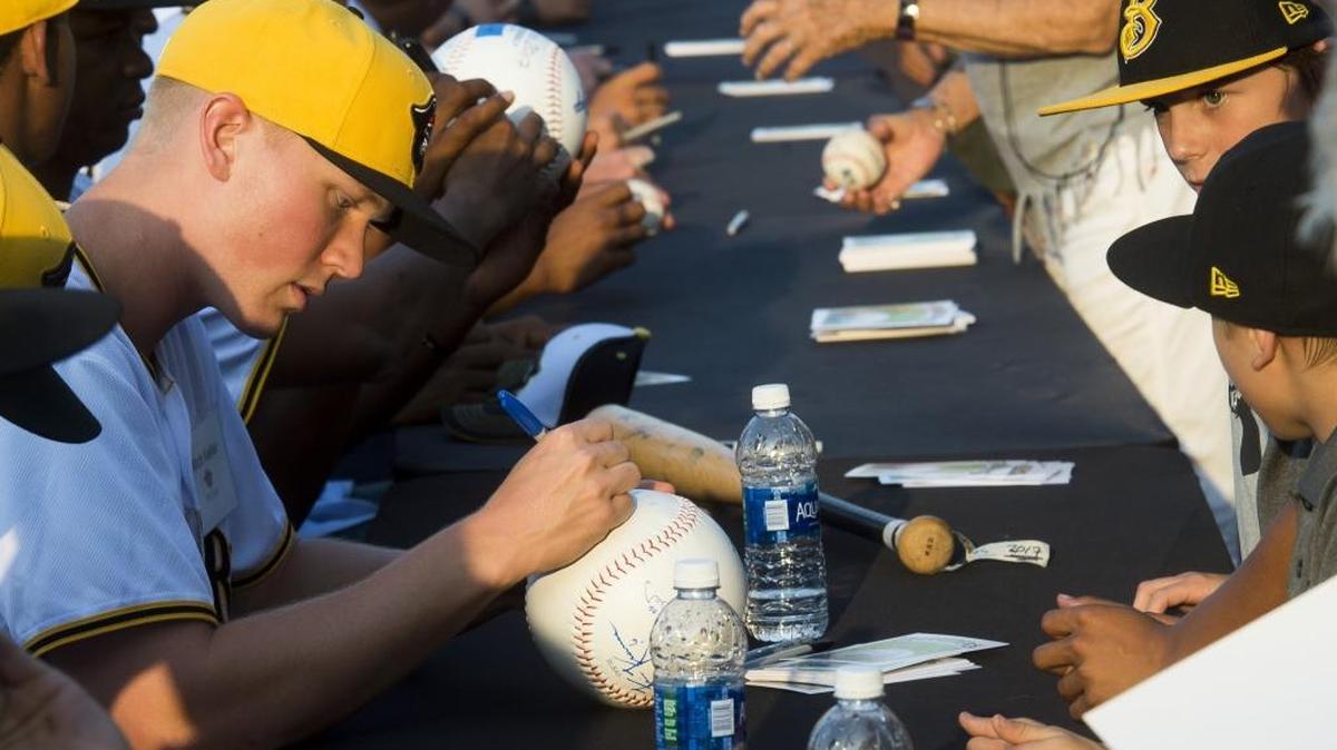 Marauders pitcher Mitch Keller signs autographs during a preseason event. Keller struggled with his command, walking three. He had walked one in his previous three starts combined. He left the game with the score tied at 3 in a game won by Fort Myers, 7-3.
