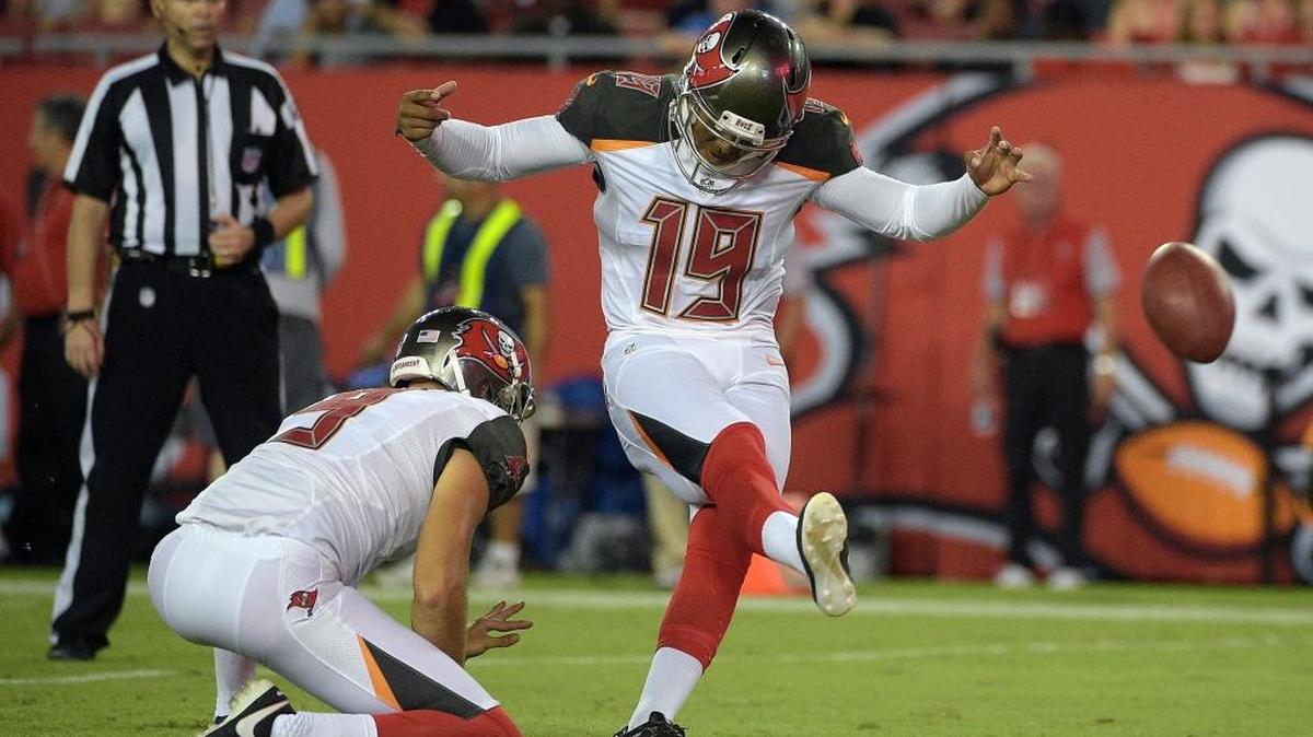 Tampa Bay Buccaneers kicker Roberto Aguayo kicks a field goal against Cleveland during the second half Friday in Tampa. Holding is Bryan Anger.